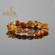 Amber bracelet with cognac color beads